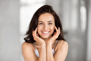Woman smiling with fresh, glowing skin from Hydrafacial in Livermore, CA
